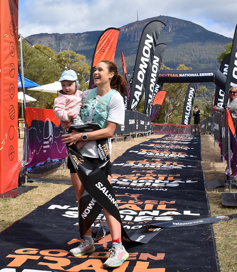 Maggie Lennox at the finish line of the kunanyi Mountain Run